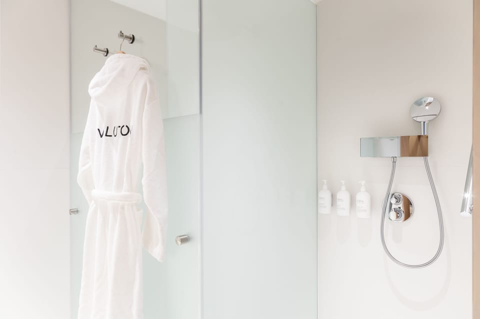 Shower, free toiletries, hair dryer, bathrobes