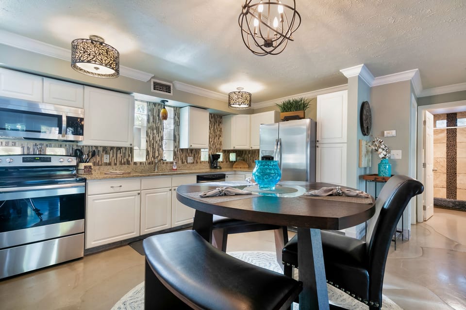 Suite, 2 Bedrooms | Private kitchen | Full-size fridge, microwave, stovetop, dishwasher