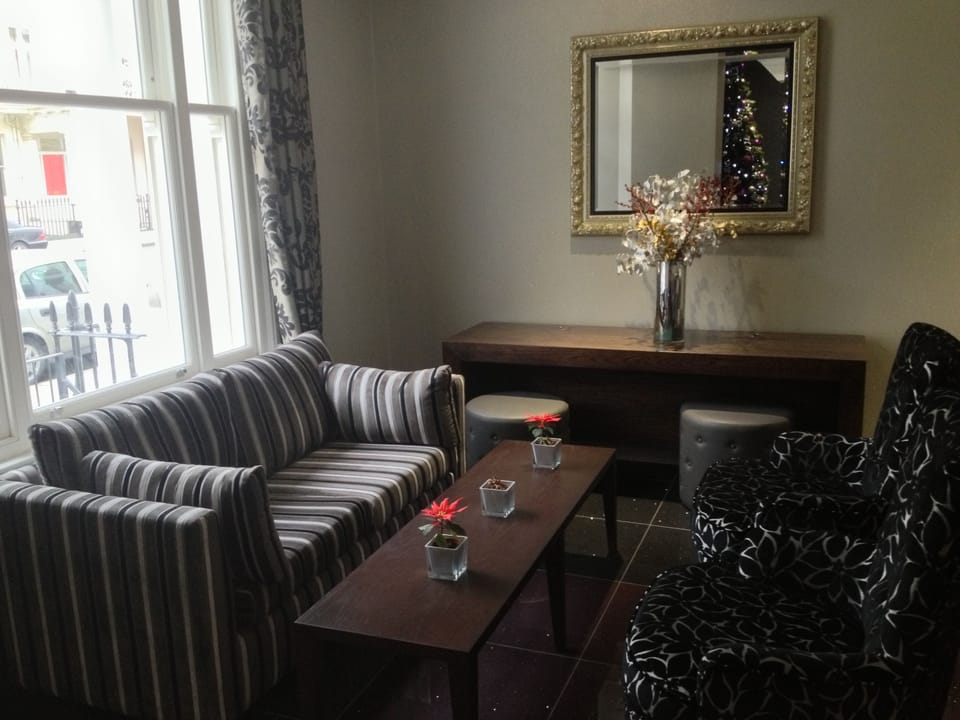 Signature Double Room | Living area | TV
