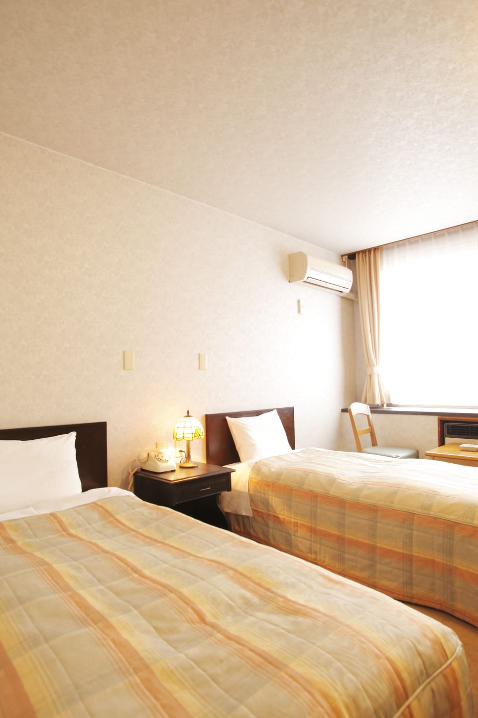 Western Twin Room with Private Bathroom | In-room safe, desk, free WiFi, bed sheets