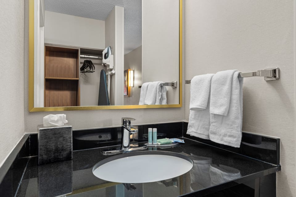 Premium bedding, desk, blackout drapes, iron/ironing board