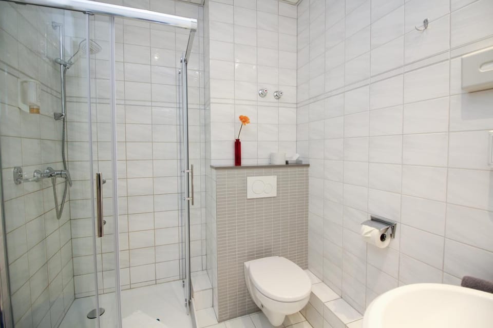 Shower, free toiletries, hair dryer, towels