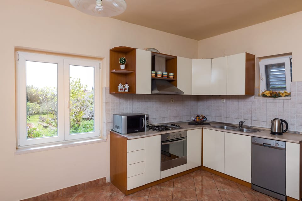 Apartment (Two Bedroom Apartment) | Private kitchen | Fridge