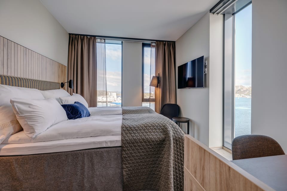 Superior Double Room, Ocean View | Desk, iron/ironing board, bed sheets