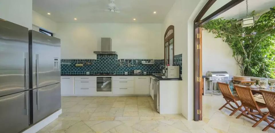 Luxury Villa | Private kitchen | Full-size fridge, microwave, oven, stovetop
