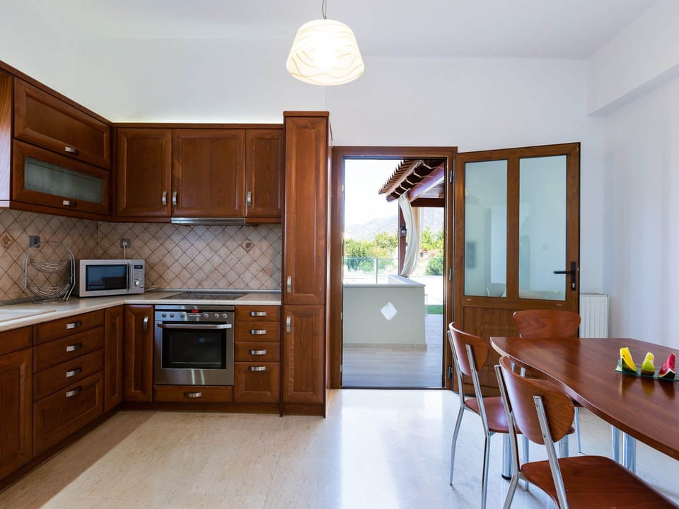 Villa | Private kitchen | Highchair, cookware/dishes/utensils