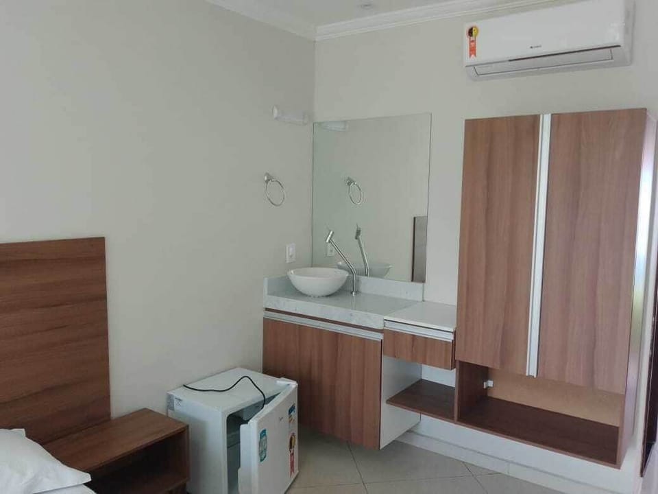 Deluxe Triple Room | Minibar, individually furnished, bed sheets