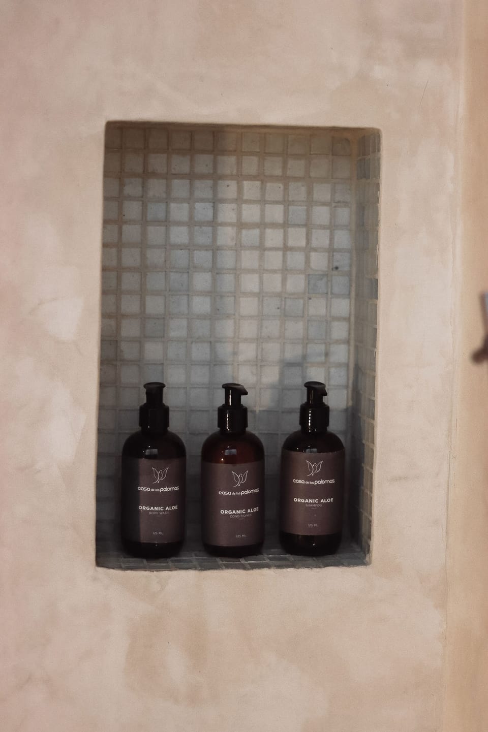 Shower, rainfall showerhead, designer toiletries, hair dryer