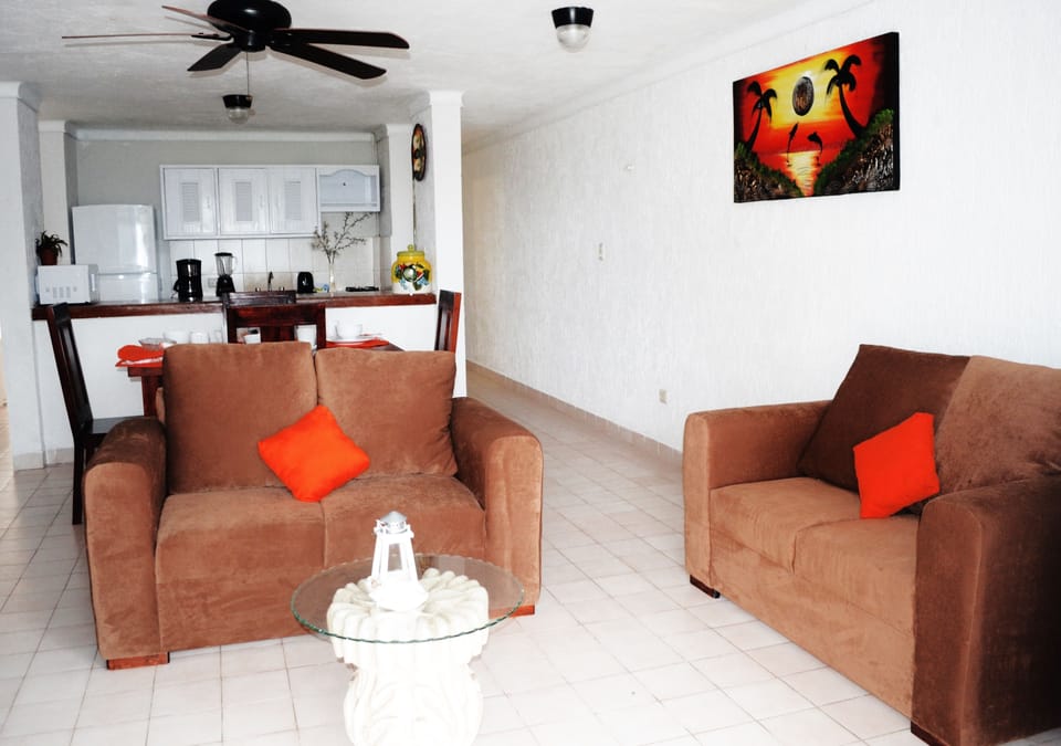 Premium Suite, 1 Bedroom, Sea View, Oceanfront | Living room | LCD TV