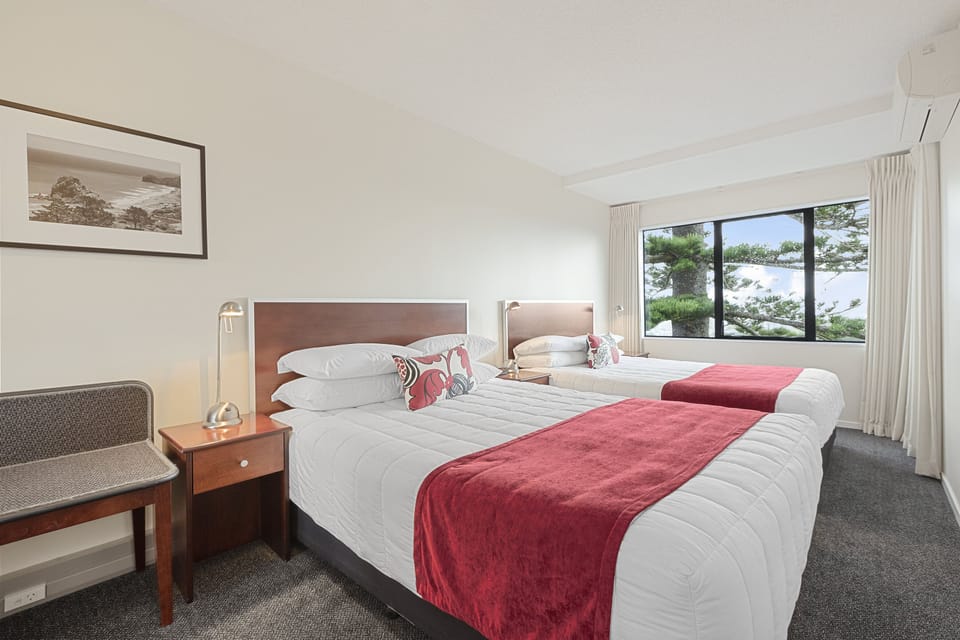 Two Bedroom Queen Apartment with Balcony | Laptop workspace, iron/ironing board, cribs/infant beds, free WiFi