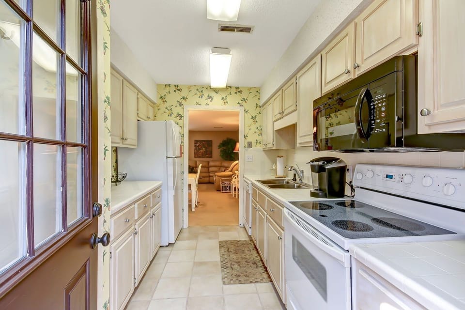 Condo, 2 Bedrooms | Private kitchen | Coffee/tea maker, fridge, oven, stovetop