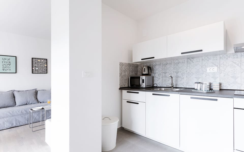 Apartment (Comfort Two Bedroom Apartment with Ba) | Private kitchen | Fridge, microwave, stovetop, dishwasher