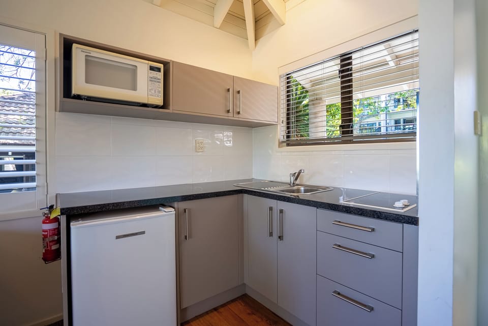 Premium Room, Kitchenette, Partial Sea View | In-room safe, individually decorated, individually furnished