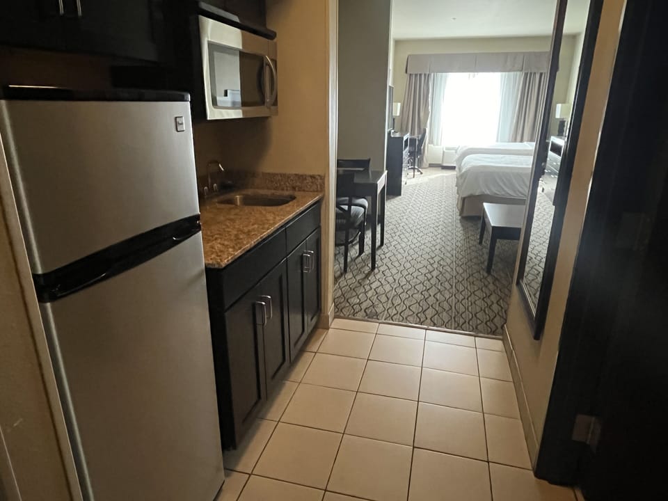 Suite | Desk, blackout drapes, iron/ironing board, cribs (free)