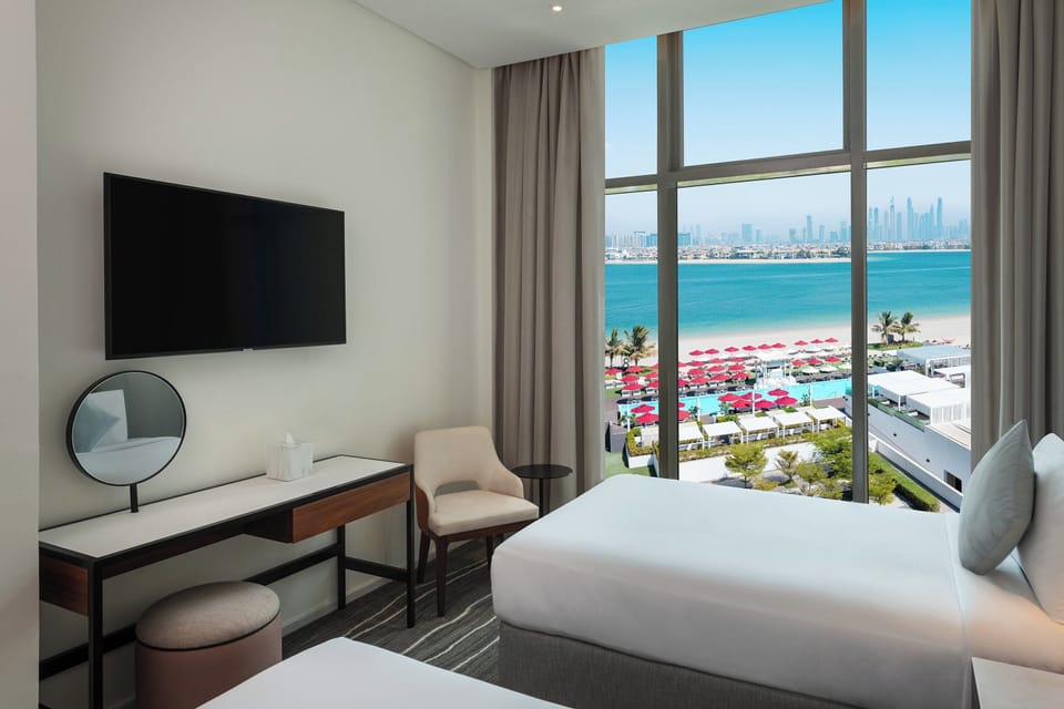 Premium bedding, pillowtop beds, minibar, in-room safe