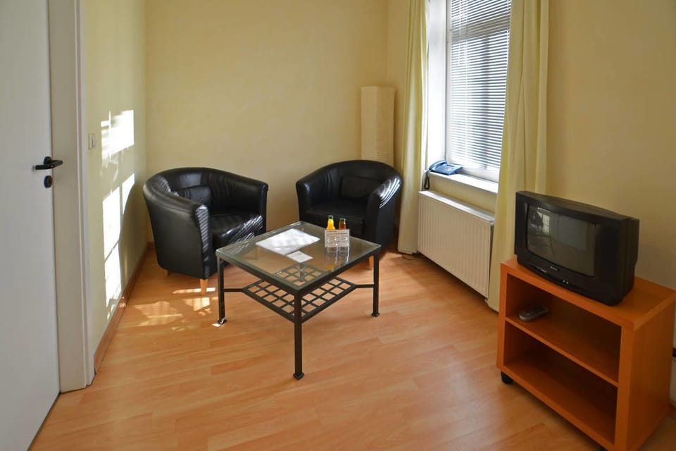 Standard Double Room | Living area | TV