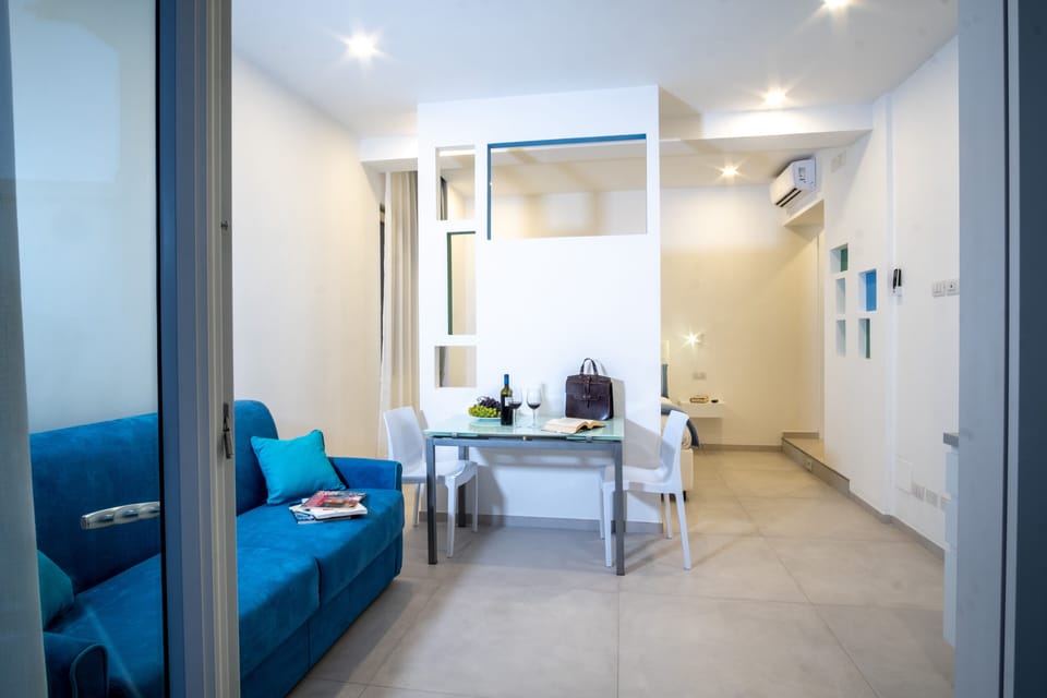 Apartment | Living area | 32-inch flat-screen TV with satellite channels, TV
