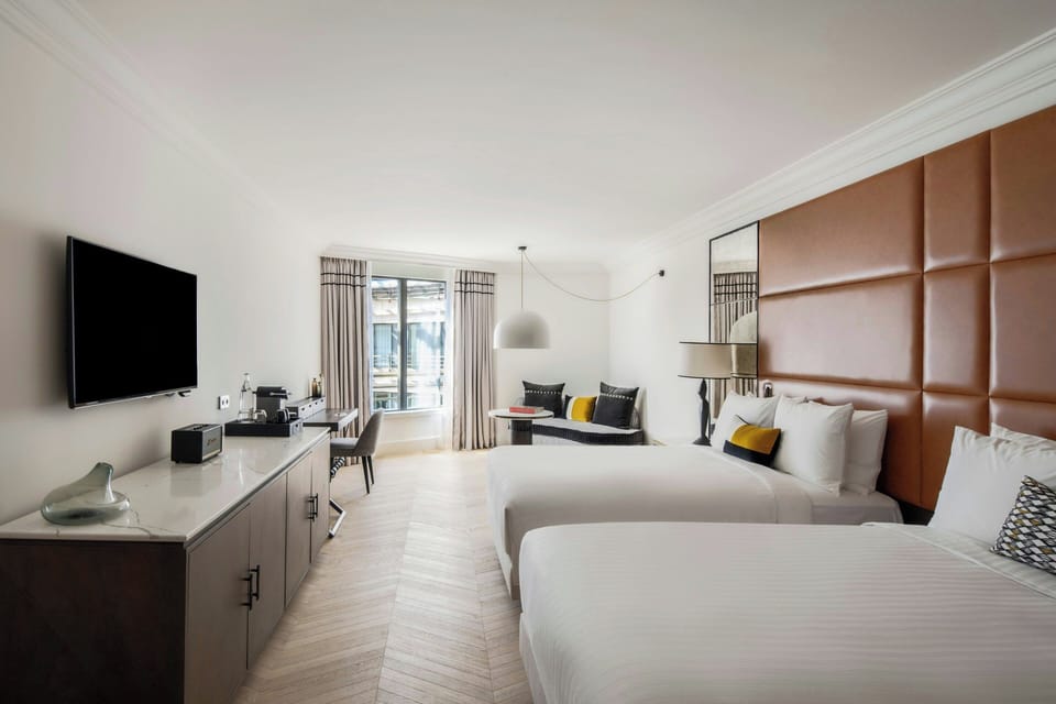 Premium bedding, down comforters, pillowtop beds, minibar