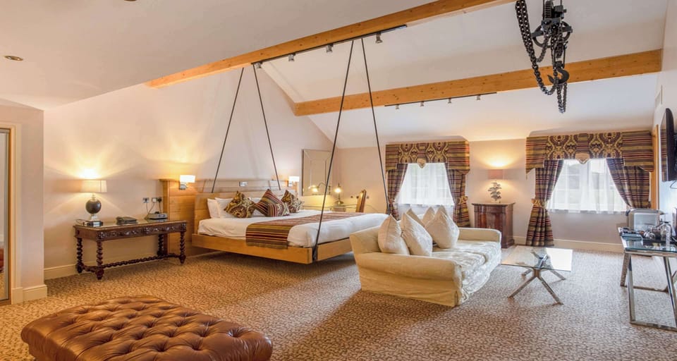 Suite, 1 King Bed, Non Smoking, Sauna | Premium bedding, in-room safe, individually decorated