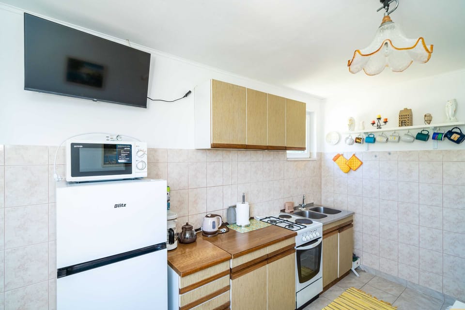 Apartment (Three Bedroom Apartment) | Private kitchen | Fridge