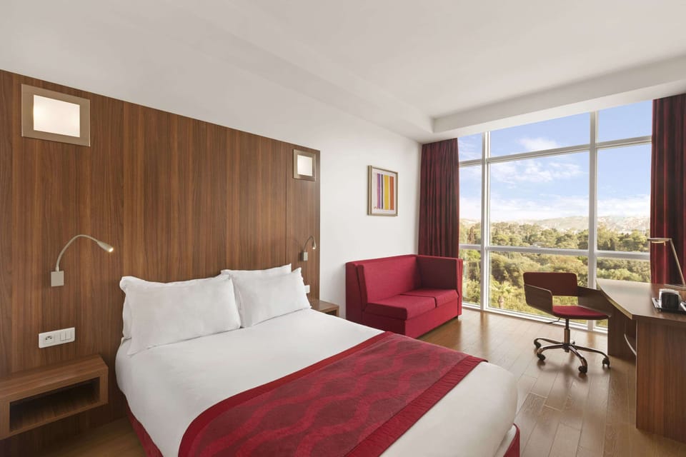 Egyptian cotton sheets, desk, blackout drapes, soundproofing