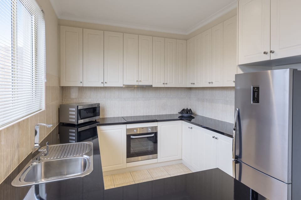 2 Bedroom Apartment | Private kitchen | Coffee/tea maker, electric kettle, toaster