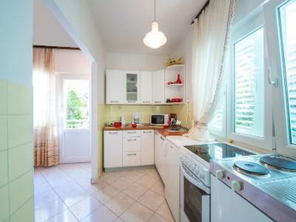 House (Three Bedroom Holiday House with Terr) | Private kitchen | Fridge