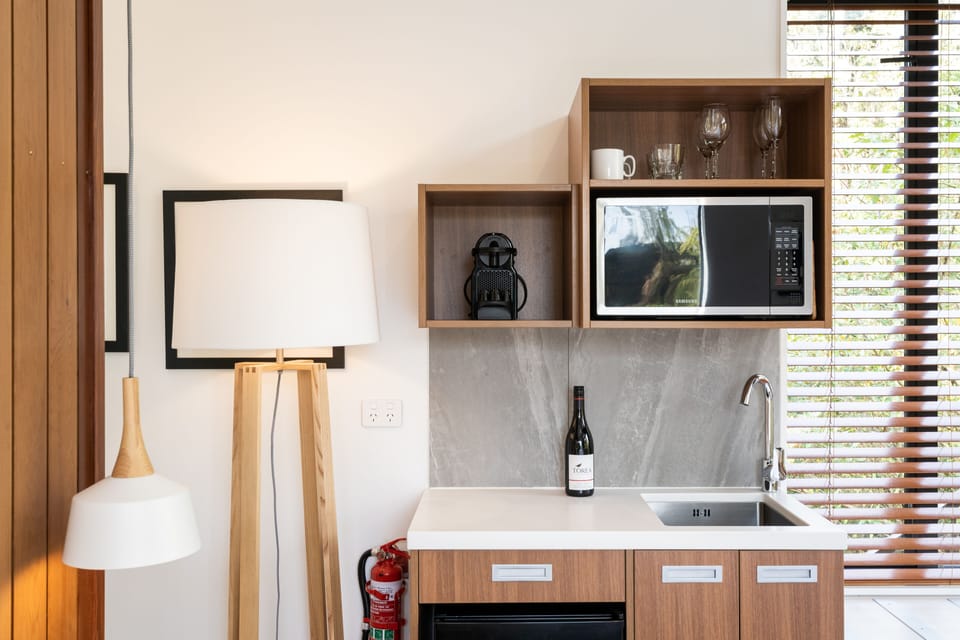 Deluxe Tree Hut | Living area | LCD TV, heated floors