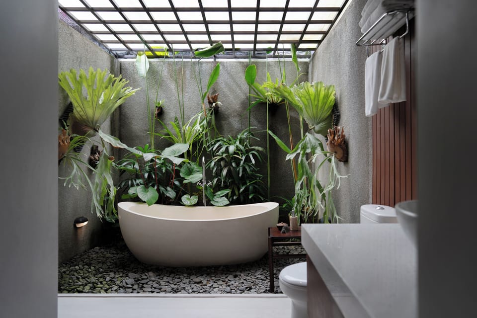 Utpala Junior Suite Bedroom | Bathroom | Shower, rainfall showerhead, free toiletries, hair dryer