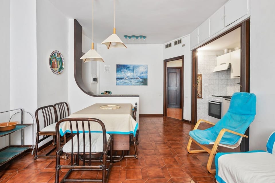 Apartment, 1 Bedroom | Living room | Flat-screen TV