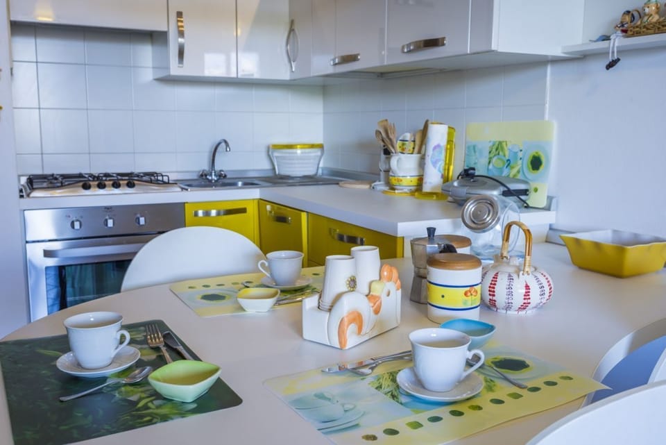 Apartment, 2 Bedrooms | Private kitchen | Fridge, oven, dishwasher, coffee/tea maker