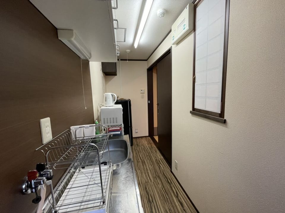 Economy House, Non Smoking | Private kitchenette | Fridge, microwave, stovetop, electric kettle