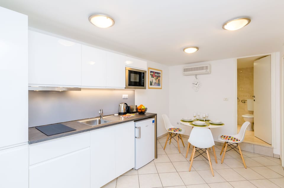 Apartment (Two Bedroom Apartment) | Private kitchenette | Fridge, microwave, stovetop, electric kettle
