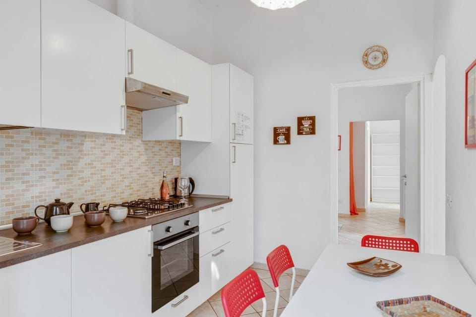 Apartment, 2 Bedrooms | Private kitchen | Full-size fridge, oven, stovetop, cookware/dishes/utensils