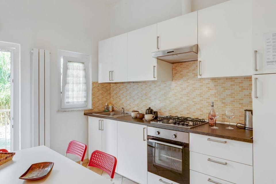 Apartment, 2 Bedrooms | Private kitchen | Full-size fridge, oven, stovetop, cookware/dishes/utensils