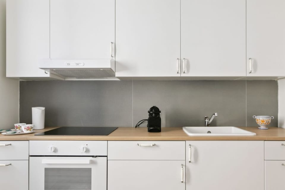 Apartment, 1 Bedroom | Private kitchen | Full-size fridge, oven, stovetop, cookware/dishes/utensils