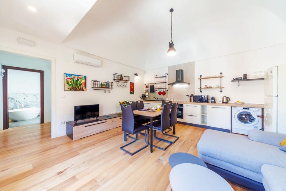 Apartment, 1 Bedroom | Living area | Flat-screen TV