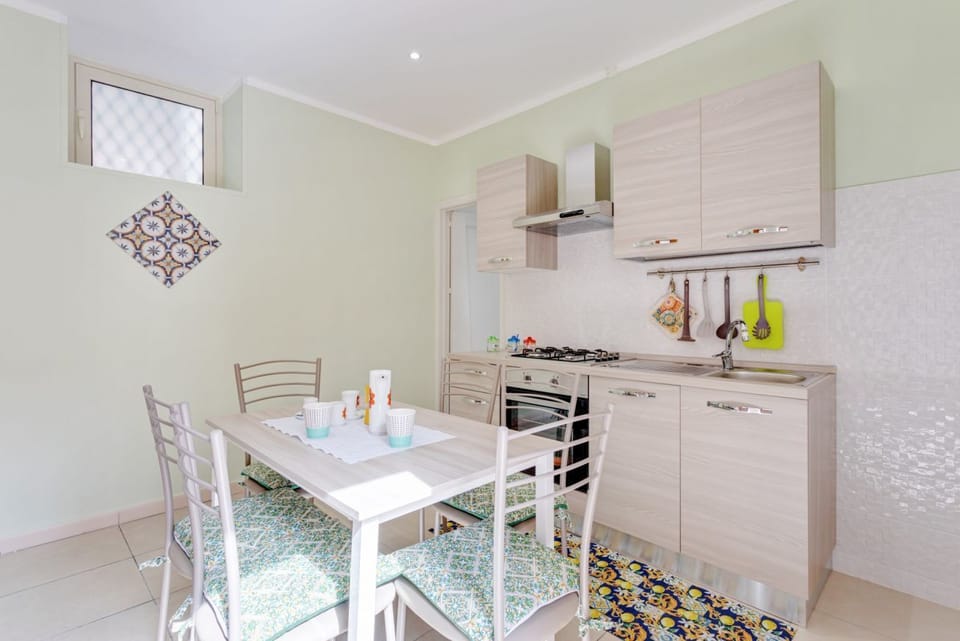 Apartment, 3 Bedrooms | Private kitchen | Full-size fridge, microwave, oven