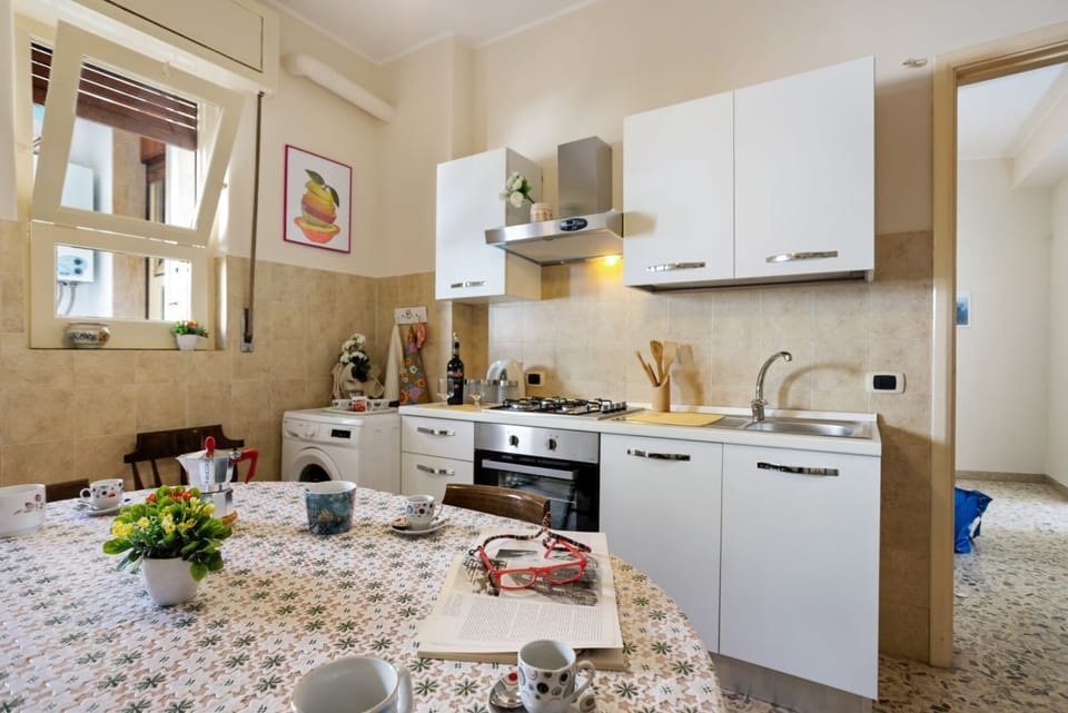 Apartment, 2 Bedrooms | Private kitchen | Mini-fridge, oven, coffee/tea maker