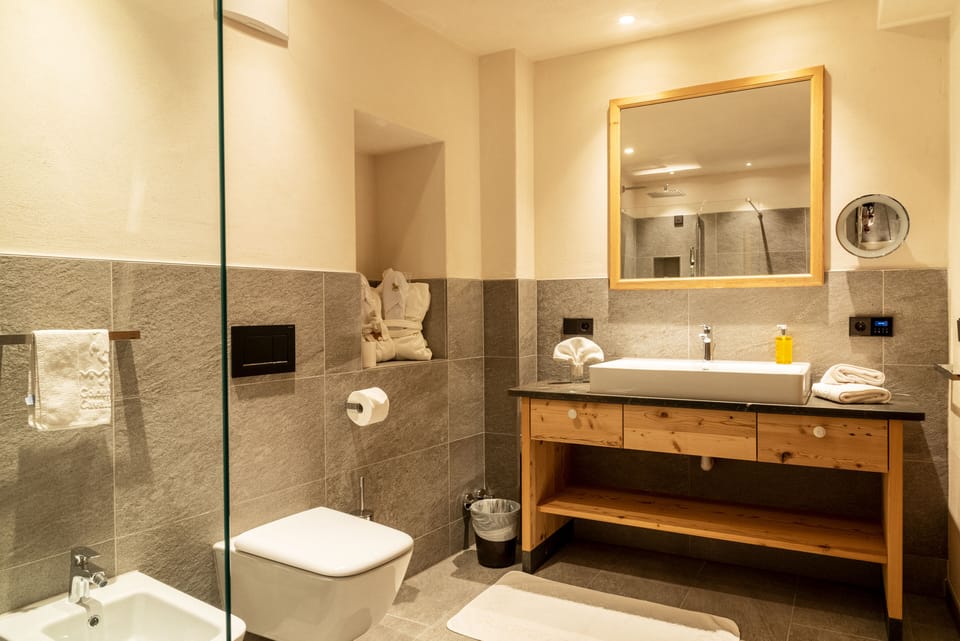 Combined shower/tub, hair dryer, bathrobes, slippers