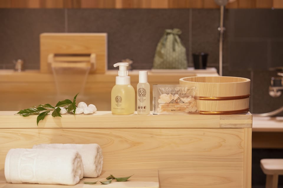 Separate tub and shower, free toiletries, slippers, bidet