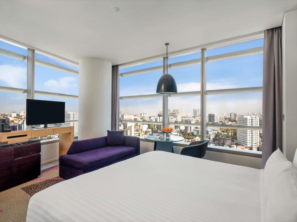 Deluxe Room, 1 King Bed | Free minibar items, in-room safe, desk, free WiFi