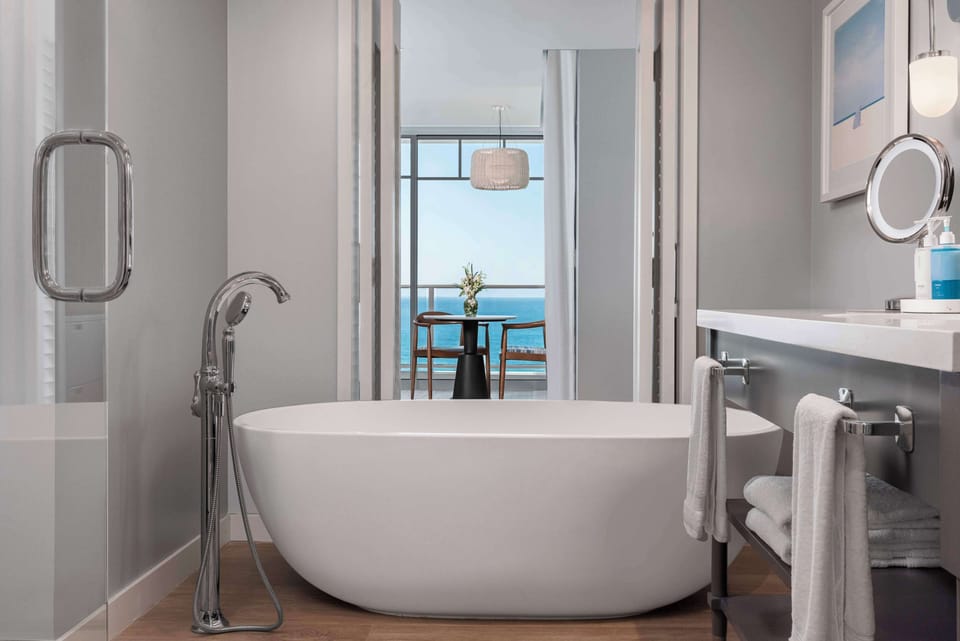 Premier Room, 1 King Bed, Oceanfront | Bathroom | Designer toiletries, hair dryer, bathrobes, slippers