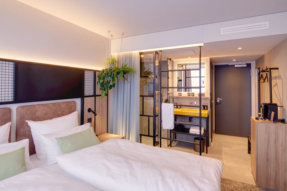Hypo-allergenic bedding, pillowtop beds, free minibar, in-room safe