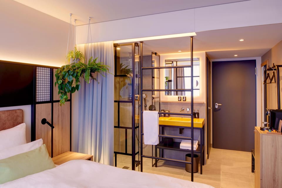 Hypo-allergenic bedding, pillowtop beds, free minibar, in-room safe