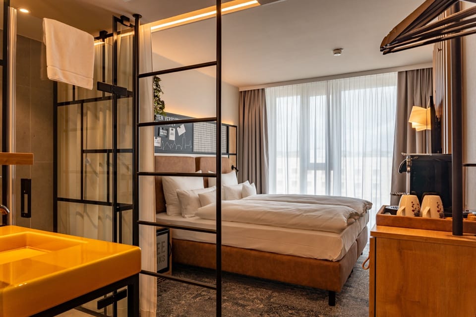 Hypo-allergenic bedding, pillowtop beds, free minibar, in-room safe
