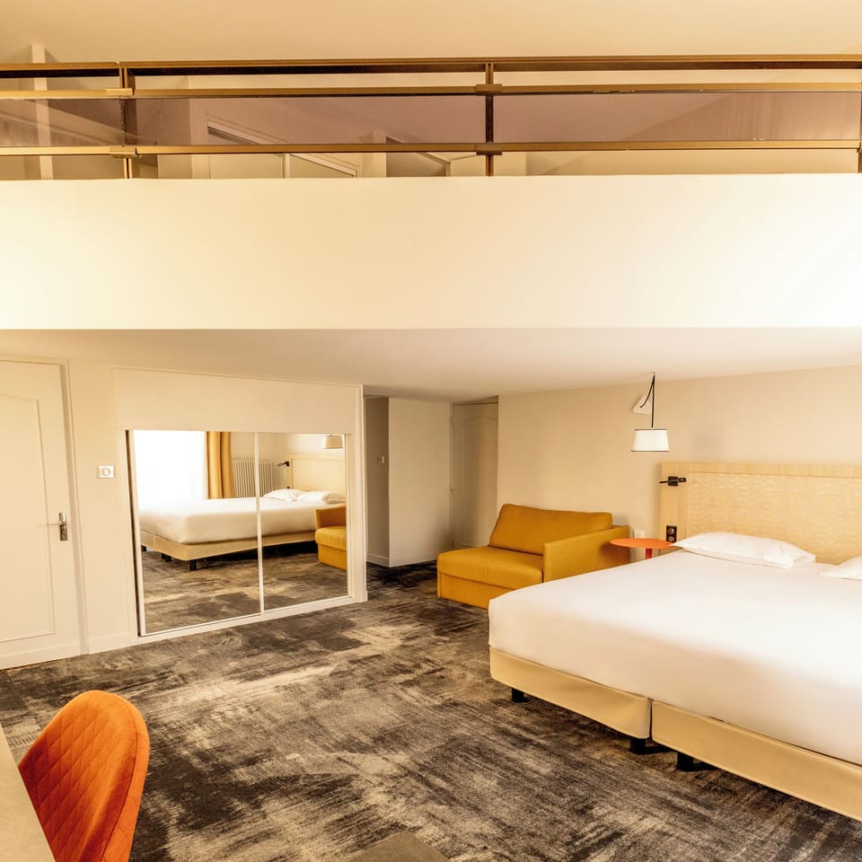 Quadruple Room | Minibar, in-room safe, desk, blackout drapes
