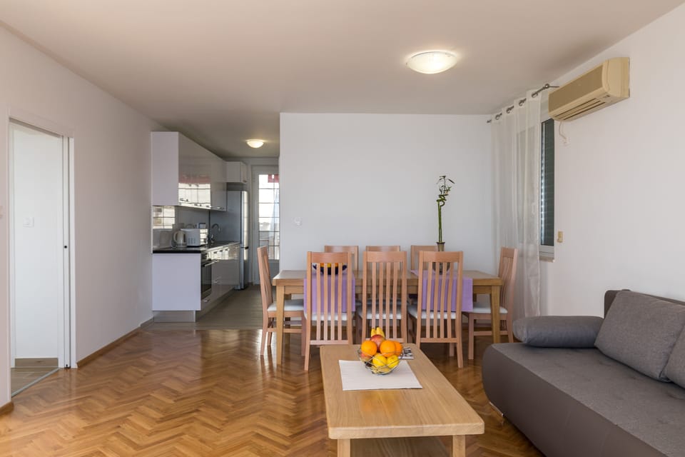 Apartment (Three Bedroom Apartment) | Living room | Flat-screen TV