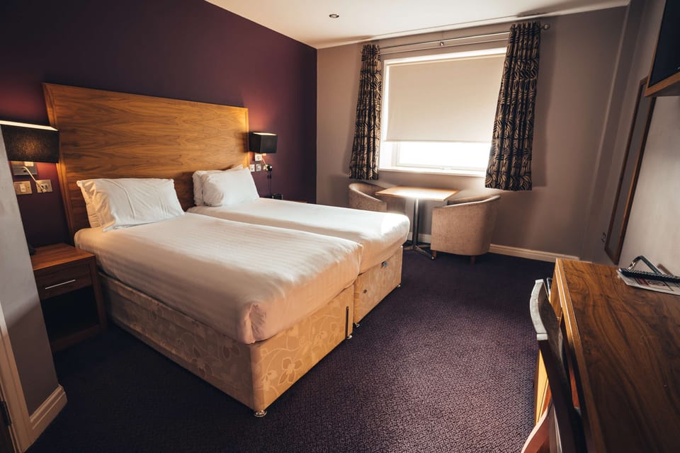 Standard Room | Desk, iron/ironing board, cribs (free), alarm clocks
