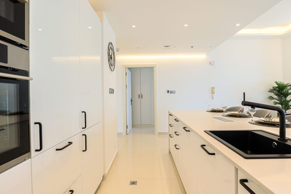 Comfort Apartment | Private kitchen | Full-size fridge, microwave, oven, stovetop